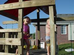 Sierra and Tommy on playset.JPG